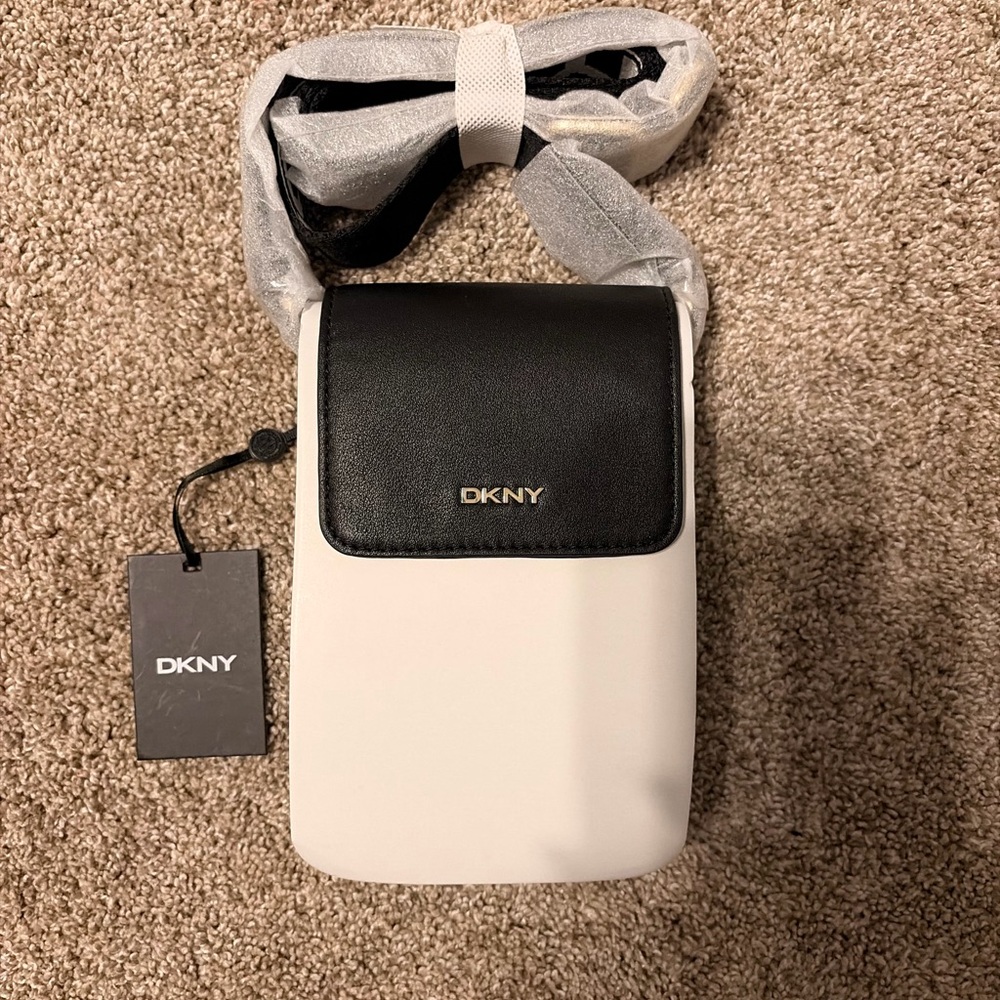 DKNY winonna flap phone bag. Black. BRAND NEW WITH TAGS.